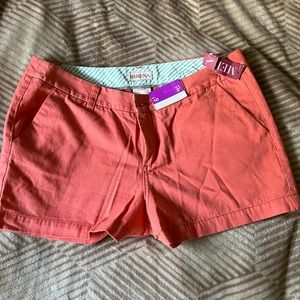 Salmon / pink colored shorts